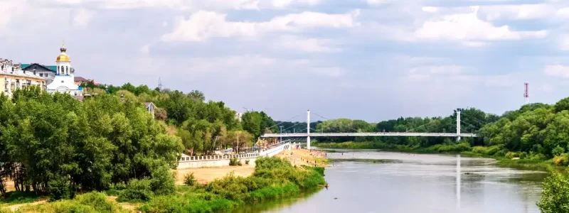 orelburg-ural-river-in-the-summer-cityscape-with-river-promenade-beach-and-bridge orelburg-ural-river-in-the-summer-cityscape-with-river-promenade-beach-and-bridge